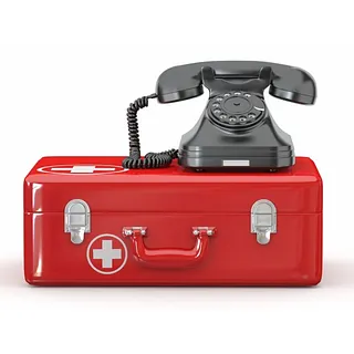 Telefon auf Notfallkoffer